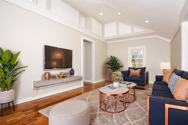 129 Locust Dr, Mastic Beach, NY 11951 - living area featuring wood finished floors, vaulted ceiling, baseboards, and recessed lighting