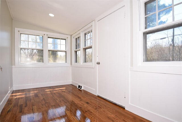 129 Locust Dr, Mastic Beach, NY 11951 - unfurnished room featuring lofted ceiling, healthy amount of natural light, dark wood-type flooring, baseboards, and recessed lighting