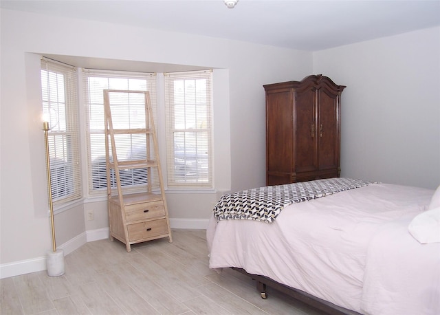 16 Hearthside Dr, Mount Sinai, NY 11766 - bedroom featuring light wood finished floors and baseboards