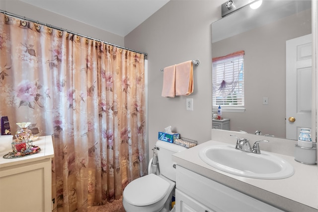 bathroom with toilet, a shower with curtain, and vanity