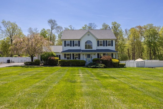 17 Frances Ln, Monroe, NY 10950 - view of front of home with fence and a front yard