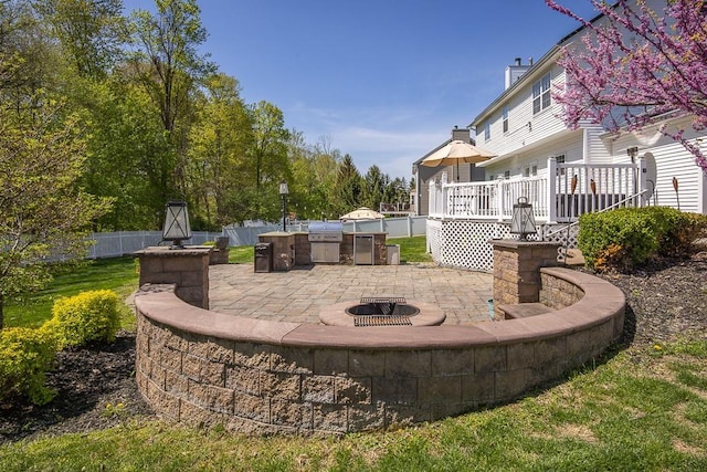 17 Frances Ln, Monroe, NY 10950 - view of patio / terrace featuring an outdoor kitchen, fence, a wooden deck, and a fire pit