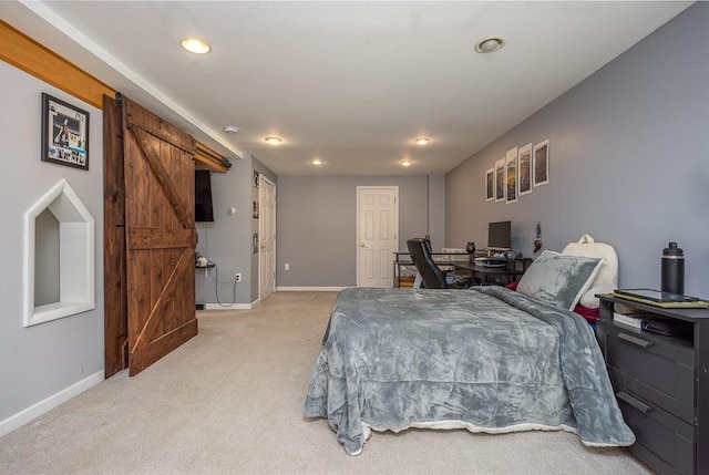 17 Frances Ln, Monroe, NY 10950 - bedroom featuring baseboards, a barn door, recessed lighting, and light carpet