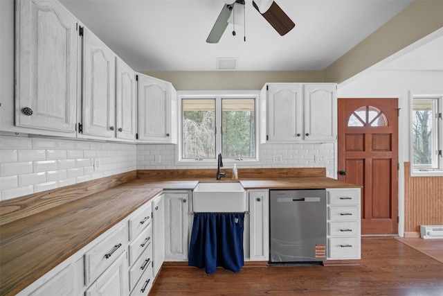 242 Callicoon Center Rd, Jeffersonville, NY 12748 - kitchen featuring a sink, stainless steel dishwasher, plenty of natural light, and butcher block counters