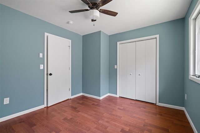 242 Callicoon Center Rd, Jeffersonville, NY 12748 - unfurnished bedroom with a closet, ceiling fan, wood finished floors, and baseboards