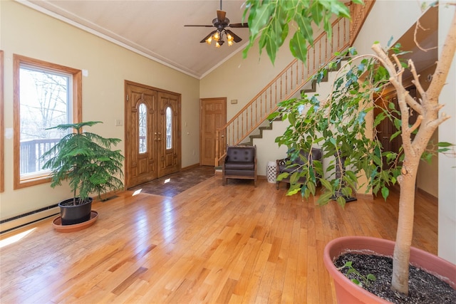 295 Overhill Rd, Stormville, NY 12582 - foyer with hardwood / wood-style floors, plenty of natural light, a ceiling fan, and stairs