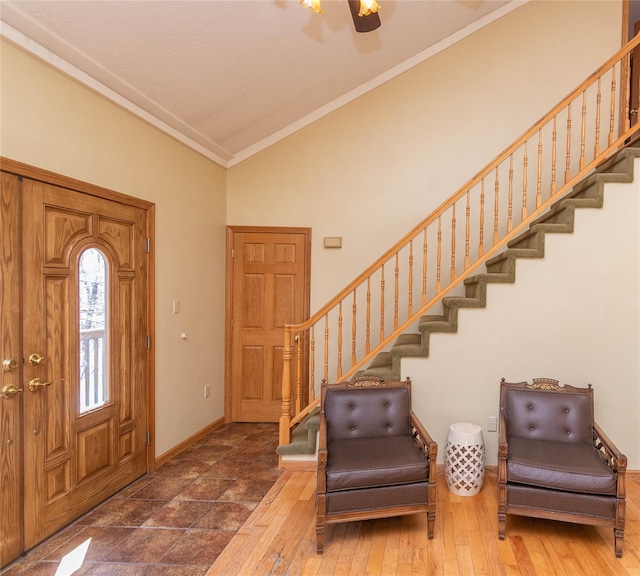295 Overhill Rd, Stormville, NY 12582 - entryway featuring baseboards, lofted ceiling, stairs, and ornamental molding
