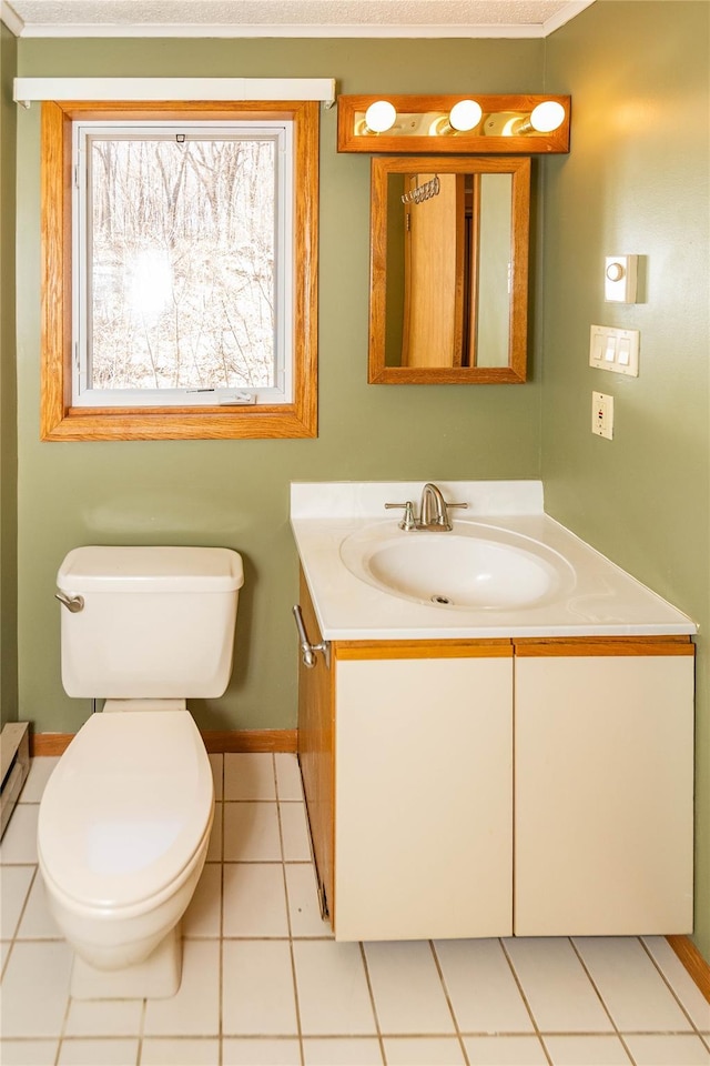 295 Overhill Rd, Stormville, NY 12582 - half bath featuring baseboards, vanity, tile patterned floors, and toilet