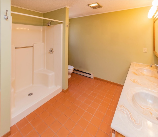 295 Overhill Rd, Stormville, NY 12582 - bathroom featuring baseboard heating, toilet, tile patterned flooring, and a sink