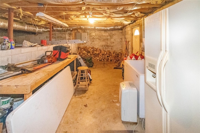 295 Overhill Rd, Stormville, NY 12582 - unfinished below grade area with white refrigerator with ice dispenser