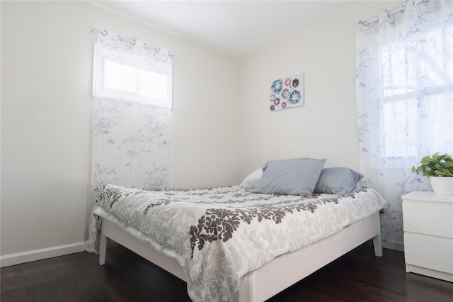 23 Cumberbach St, Wyandanch, NY 11798 - bedroom with baseboards and wood finished floors