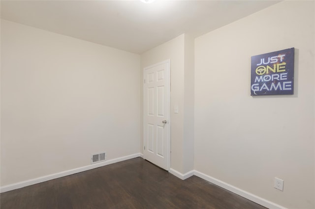 23 Cumberbach St, Wyandanch, NY 11798 - unfurnished room featuring baseboards, visible vents, and dark wood-style floors
