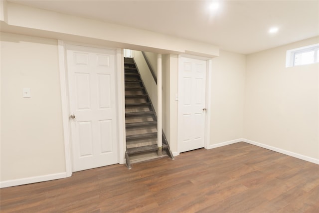23 Cumberbach St, Wyandanch, NY 11798 - basement featuring stairway, baseboards, recessed lighting, and dark wood-type flooring