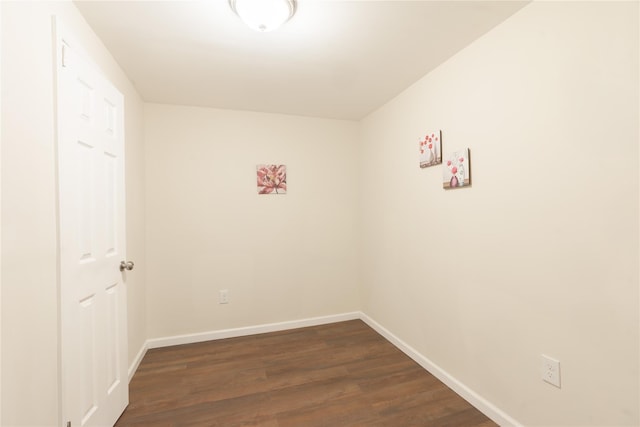 23 Cumberbach St, Wyandanch, NY 11798 - unfurnished room featuring baseboards and dark wood-style flooring