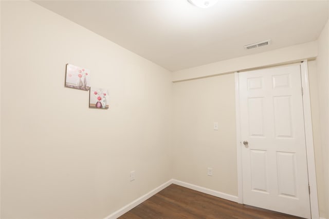23 Cumberbach St, Wyandanch, NY 11798 - empty room featuring baseboards, dark wood-style flooring, and visible vents