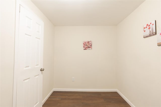 23 Cumberbach St, Wyandanch, NY 11798 - spare room with baseboards and dark wood-style flooring