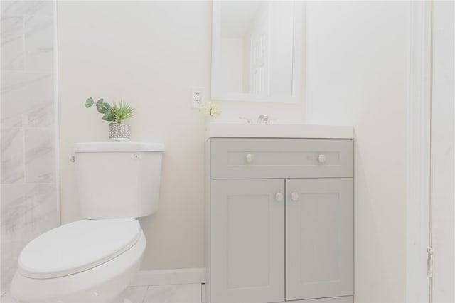 23 Cumberbach St, Wyandanch, NY 11798 - bathroom with baseboards, vanity, and toilet