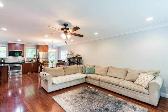 69 Taylor Rd, Patterson, NY 12563 - living room with ceiling fan, healthy amount of natural light, dark wood-style floors, recessed lighting, and crown molding