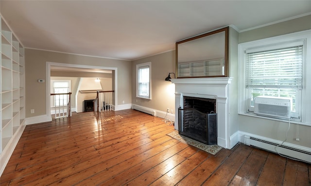 78 Closter Rd, Palisades, NY 10964 - unfurnished living room featuring crown molding, a fireplace, baseboard heating, hardwood / wood-style flooring, and a baseboard heating unit