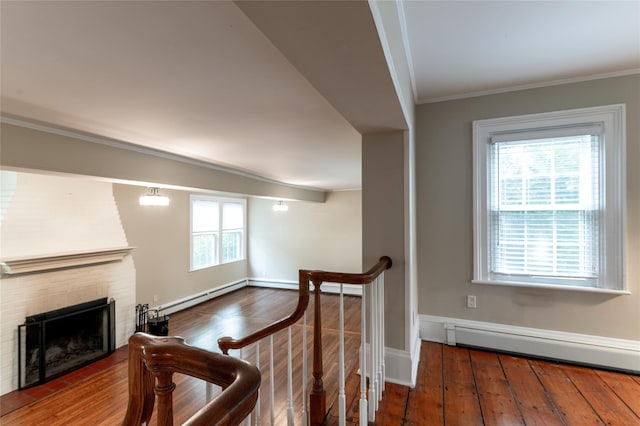 78 Closter Rd, Palisades, NY 10964 - interior space featuring baseboards, ornamental molding, baseboard heating, and hardwood / wood-style floors