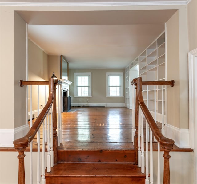 78 Closter Rd, Palisades, NY 10964 - stairs with a fireplace, a baseboard heating unit, and hardwood / wood-style floors