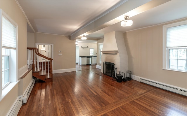 78 Closter Rd, Palisades, NY 10964 - unfurnished living room with ornamental molding, stairs, a fireplace, baseboards, and hardwood / wood-style flooring