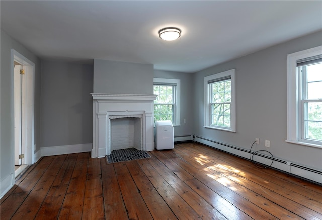 78 Closter Rd, Palisades, NY 10964 - unfurnished living room featuring baseboards, a fireplace with flush hearth, baseboard heating, and hardwood / wood-style floors