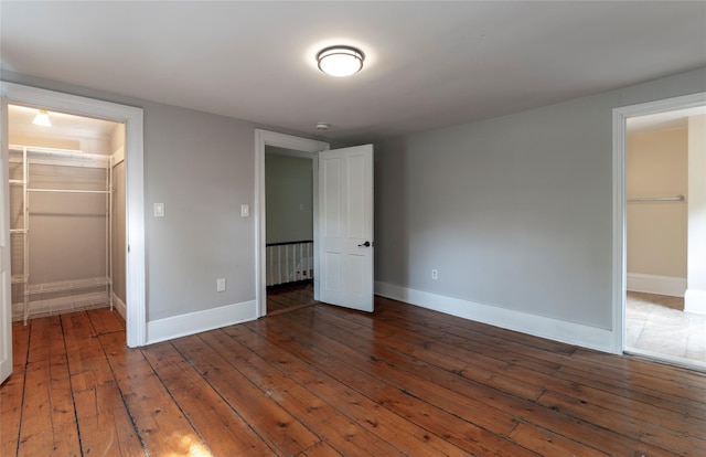 78 Closter Rd, Palisades, NY 10964 - unfurnished bedroom with baseboards, wood-type flooring, and a spacious closet
