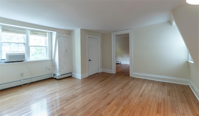78 Closter Rd, Palisades, NY 10964 - bonus room featuring light wood-style floors, baseboards, cooling unit, and baseboard heating