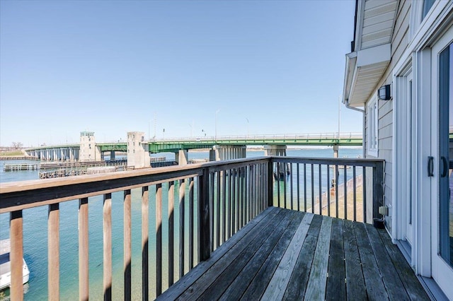 deck featuring a water view