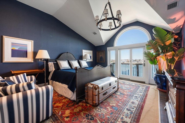 bedroom with vaulted ceiling, a notable chandelier, access to exterior, and visible vents