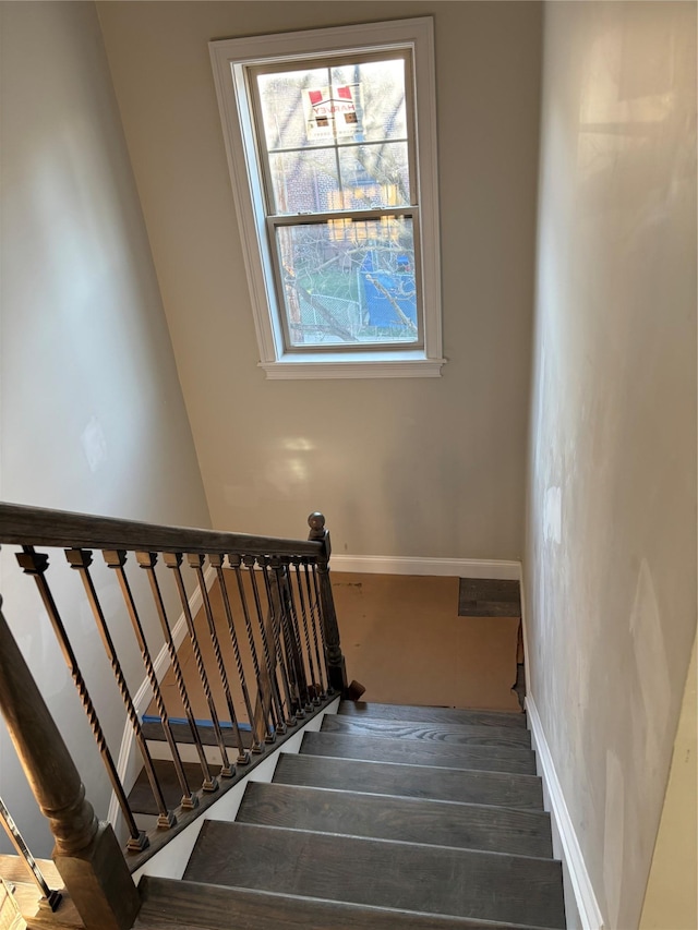67 2nd St W, Mount Vernon, NY 10550 - stairway featuring wood finished floors and baseboards