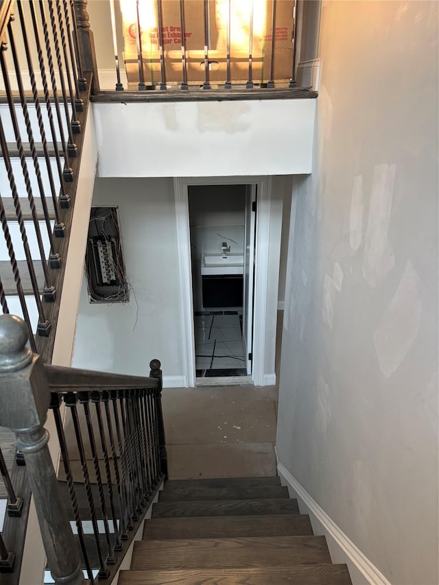 67 2nd St W, Mount Vernon, NY 10550 - staircase with concrete floors and baseboards