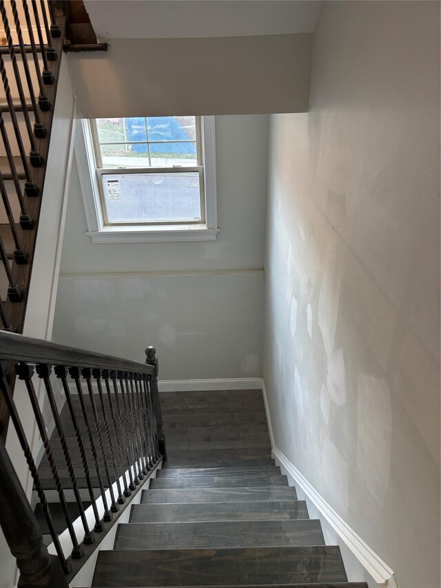 67 2nd St W, Mount Vernon, NY 10550 - staircase featuring wood finished floors and baseboards