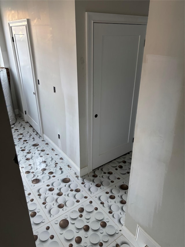 67 2nd St W, Mount Vernon, NY 10550 - hallway featuring baseboards and light tile patterned floors