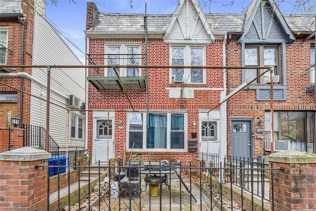 1816 21st Dr, Astoria, NY 11105 - multi unit property with a high end roof, brick siding, and fence private yard