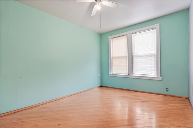 1816 21st Dr, Astoria, NY 11105 - spare room with light wood-type flooring, a ceiling fan, and baseboards