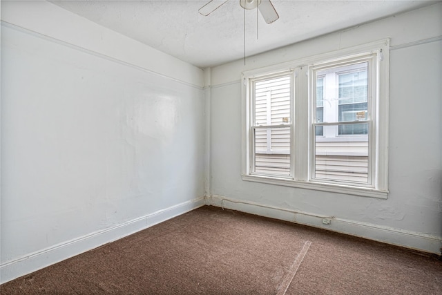 1816 21st Dr, Astoria, NY 11105 - empty room featuring dark colored carpet, a textured ceiling, baseboards, and ceiling fan