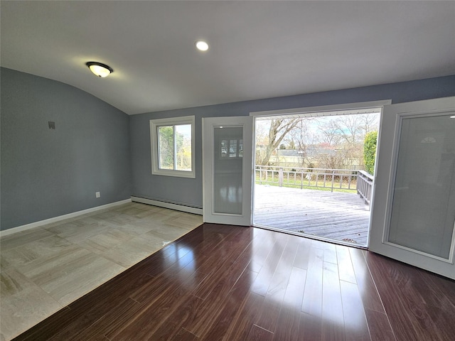 entrance foyer featuring recessed lighting, wood finished floors, vaulted ceiling, baseboard heating, and baseboards