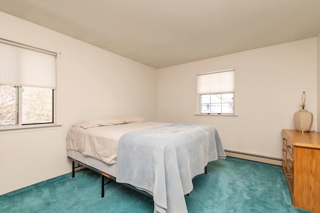 carpeted bedroom with a baseboard heating unit