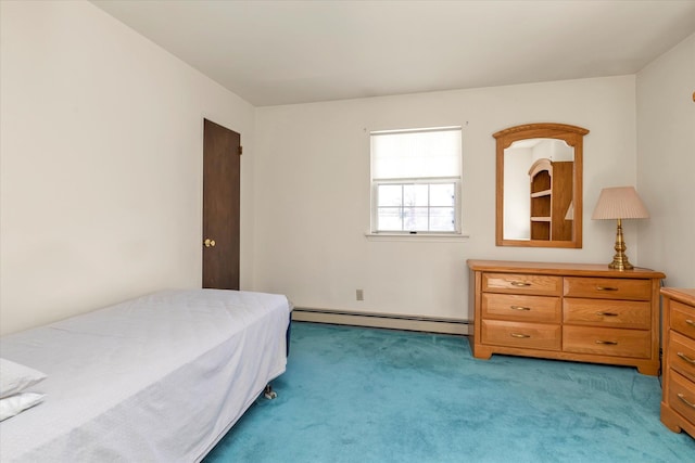 carpeted bedroom with a baseboard heating unit