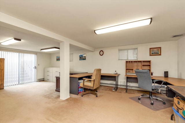 carpeted home office featuring baseboard heating and visible vents