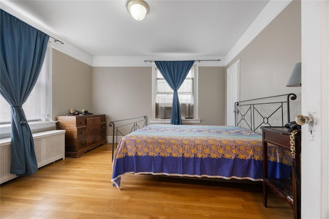 bedroom featuring hardwood / wood-style flooring