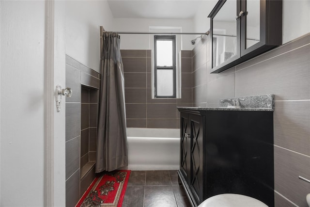 full bathroom featuring tile patterned floors, shower / tub combo, toilet, and vanity