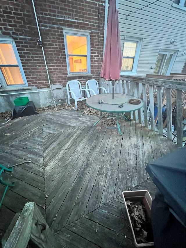 wooden deck with outdoor dining area