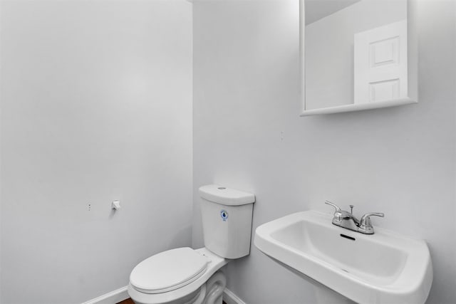 5 Fitzherbert Mews, Middletown, NY 10940 - half bathroom with baseboards, a sink, and toilet