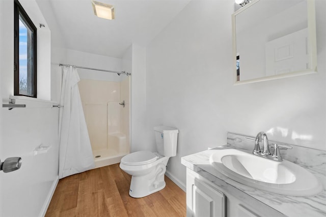 5 Fitzherbert Mews, Middletown, NY 10940 - full bathroom featuring curtained shower, wood finished floors, baseboards, vanity, and toilet