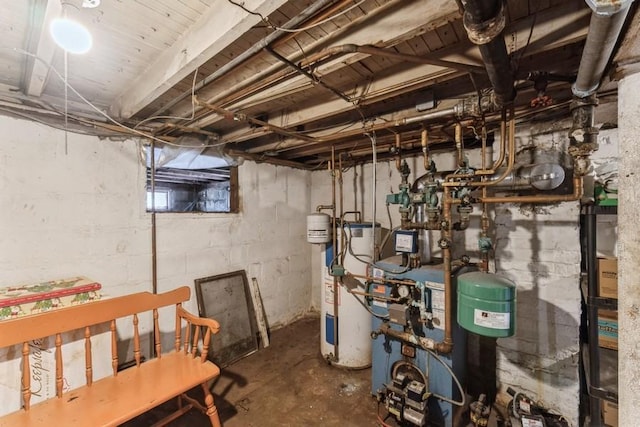 utility room with water heater and a heating unit