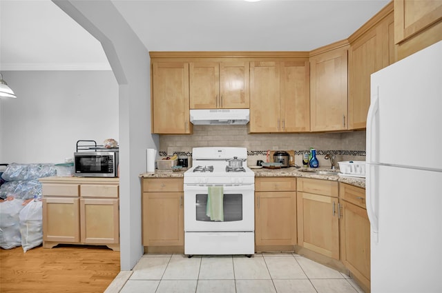 4415 Mundy Ln, Bronx, NY 10466 - kitchen featuring white appliances, under cabinet range hood, light brown cabinets, tasteful backsplash, and ornamental molding