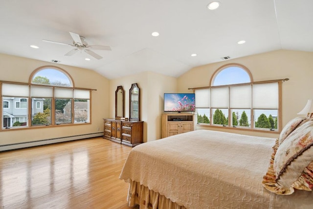 bedroom with a baseboard heating unit, light wood-style floors, lofted ceiling, visible vents, and recessed lighting